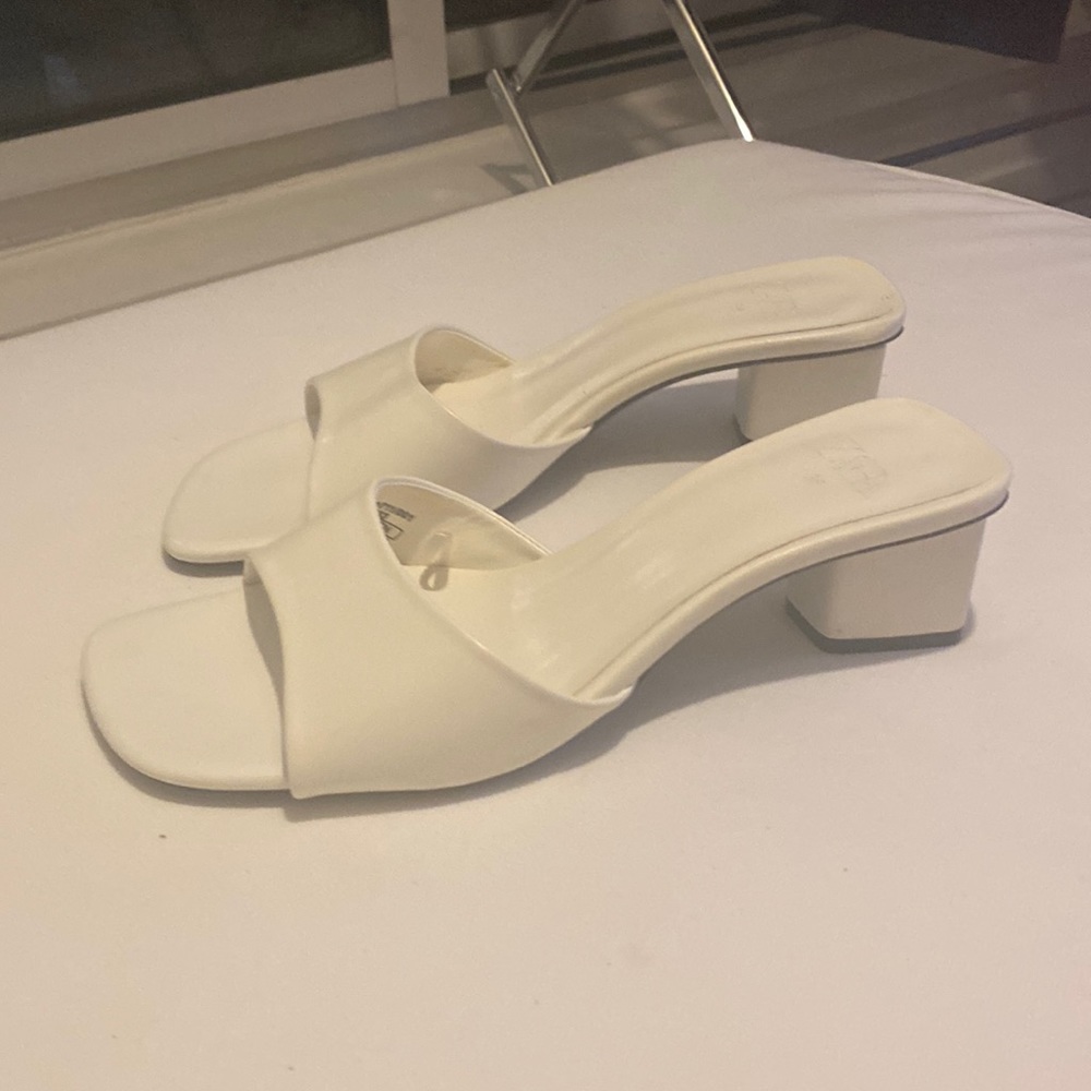 White heeled mules